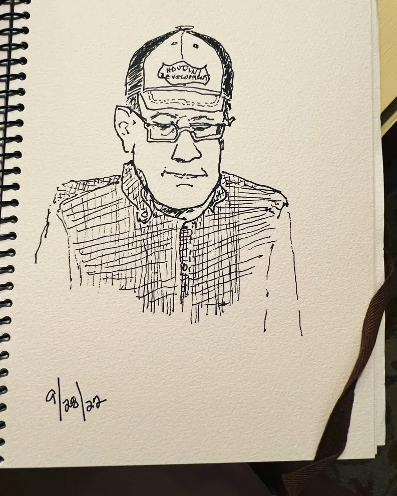 A drawing of an old man with glasses