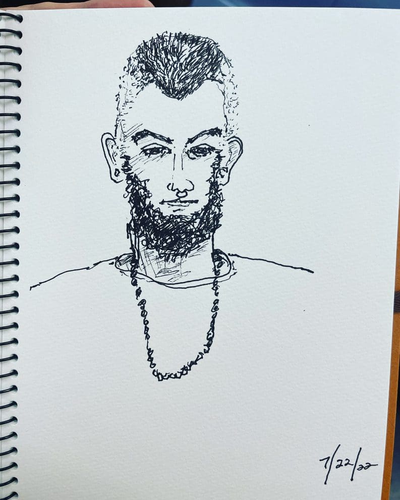 A drawing of a man with a beard and necklace.